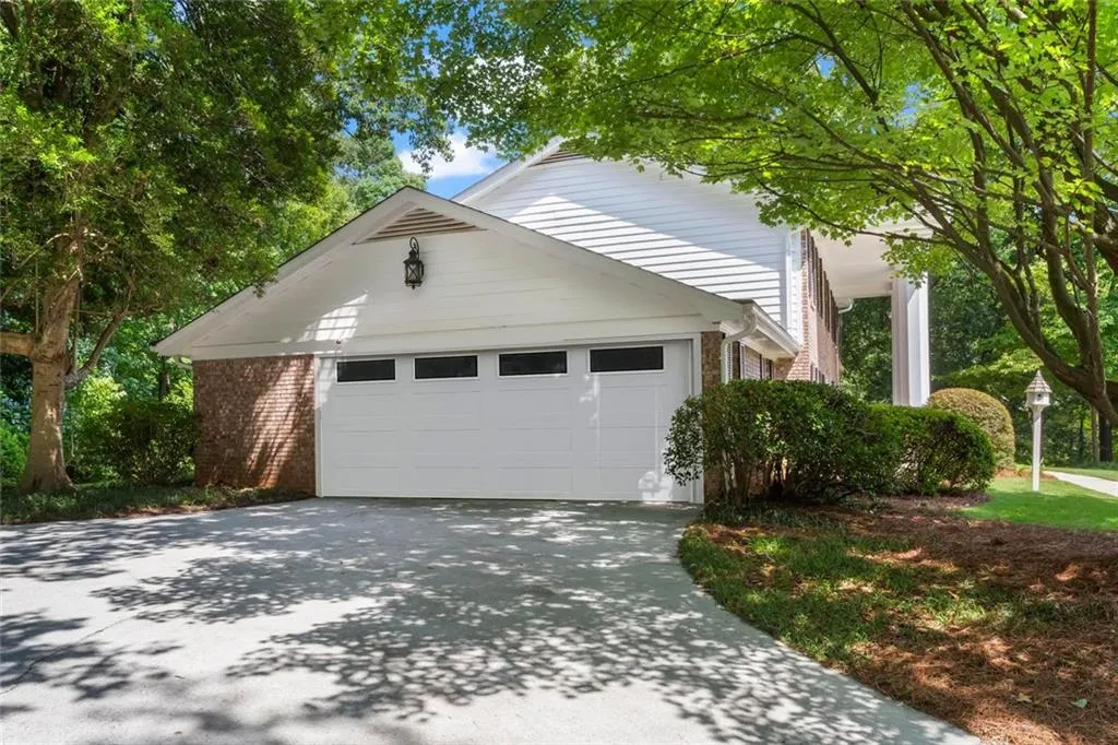Virtual view of the bonus recreation room converted back into a functional two-car garage.
