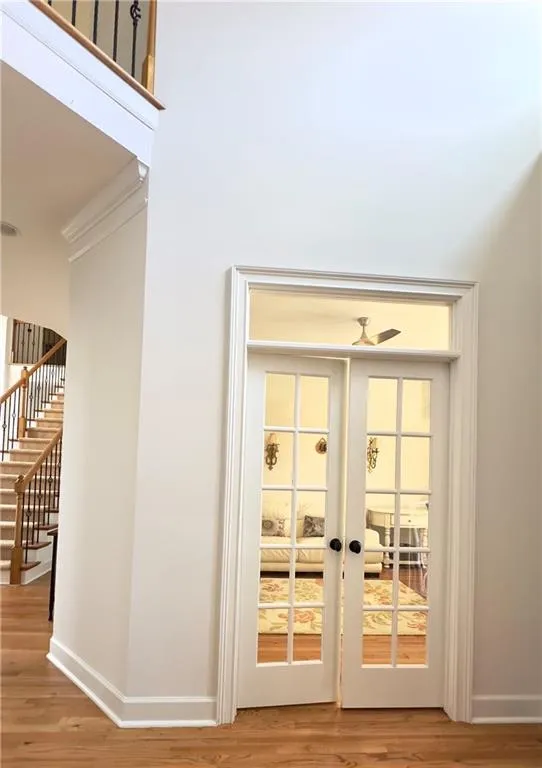 Large Executive style office with double glass doors for a pleasant work at Home experience.