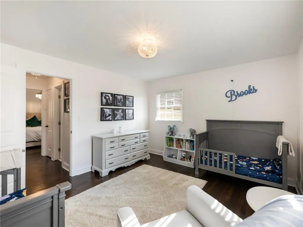 Bedroom featuring dark hardwood / wood-style flooring