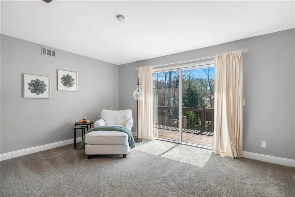Sitting room with dark carpet