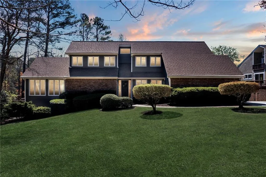 View of front of home with a lawn