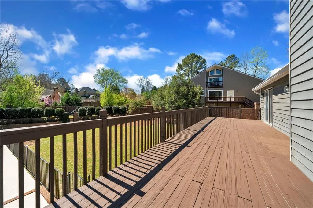 Deck featuring a yard