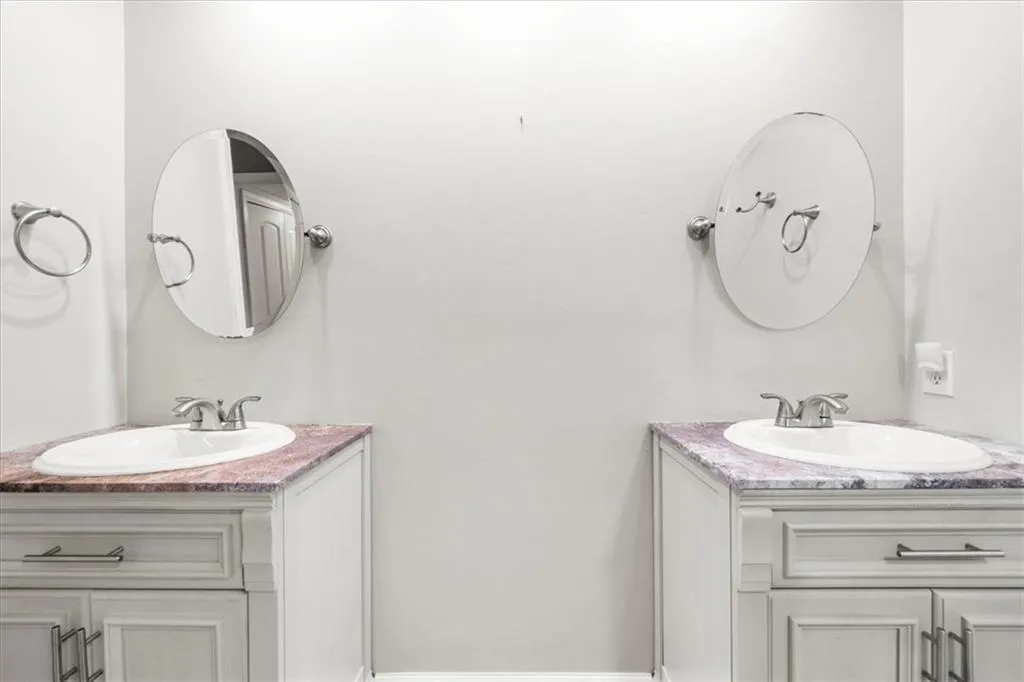 Bathroom featuring vanity Bathroom featuring vanity