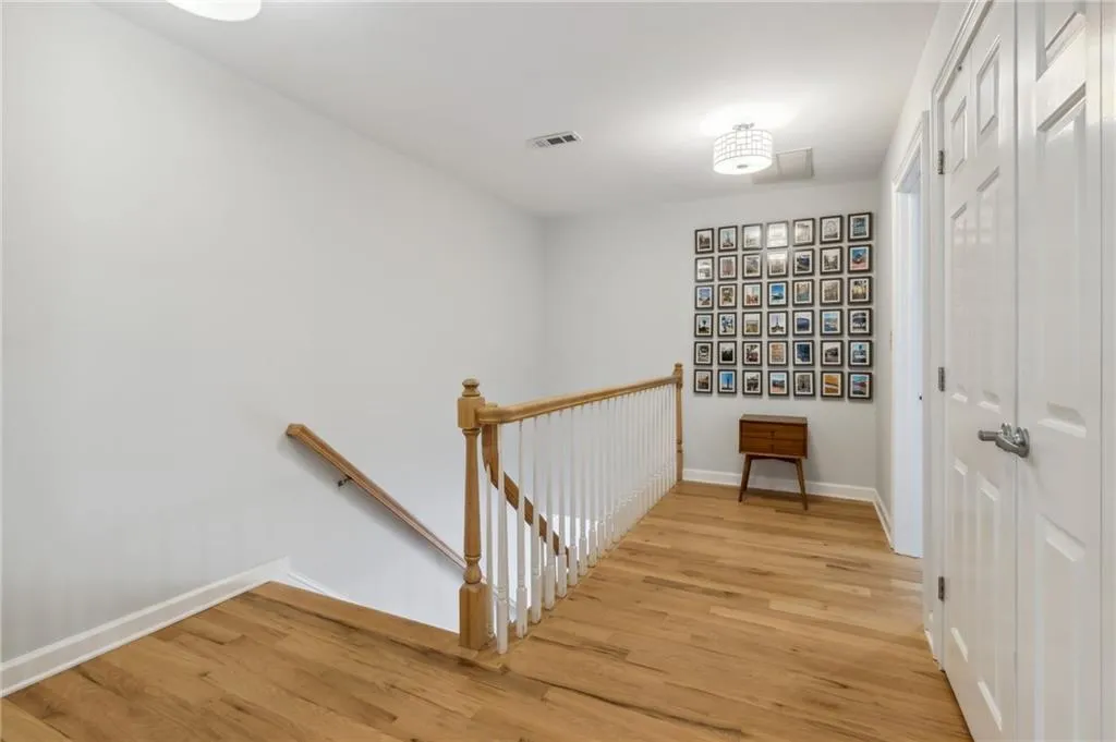 Stairs with light wood-type flooring