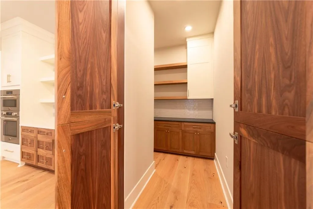 Hall featuring light hardwood / wood-style floors