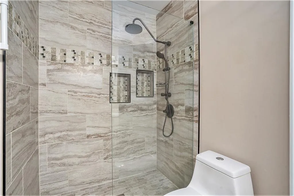 Bathroom with walk-in tile shower