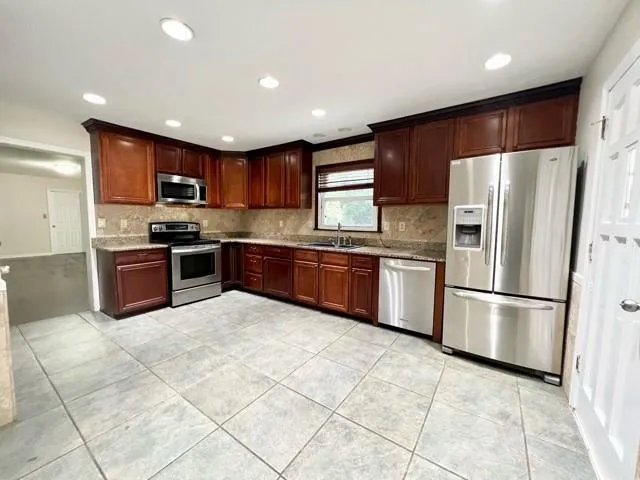 610 Spalding Drive, Sandy Springs, Georgia 30328, 4 Bedrooms Bedrooms, ,3 BathroomsBathrooms,Residential,Sold,610 Spalding Drive,7068547