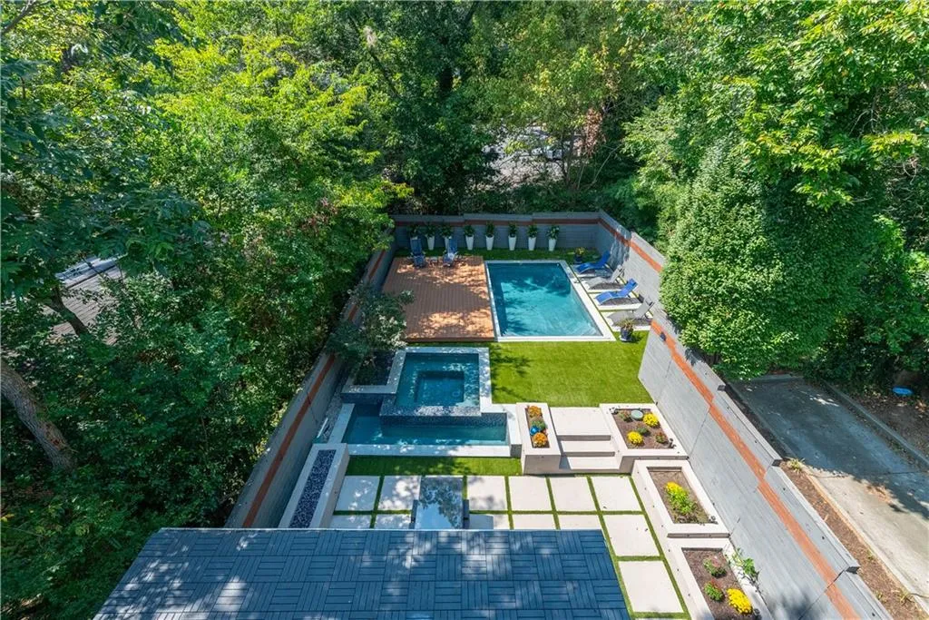 Outdoor area from roof top deck showing pool open