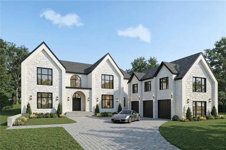 French country inspired facade featuring a front yard, stone siding, a garage, and decorative driveway