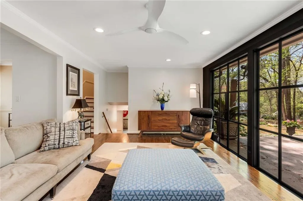 Family area featuring recessed lighting, crown molding, a ceiling fan, and wood finished floors