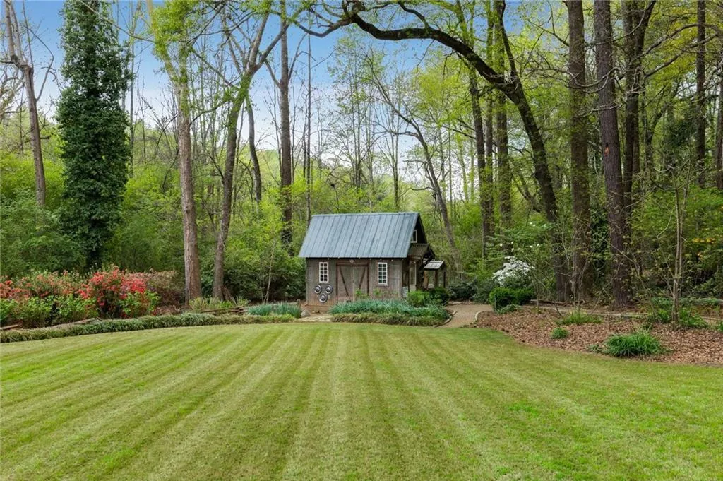 Expansive view of lush lawn and peaceful surroundings
