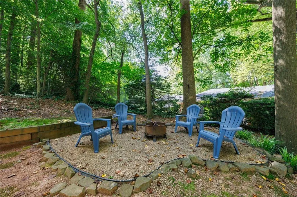 View of patio featuring an outdoor fire pit
