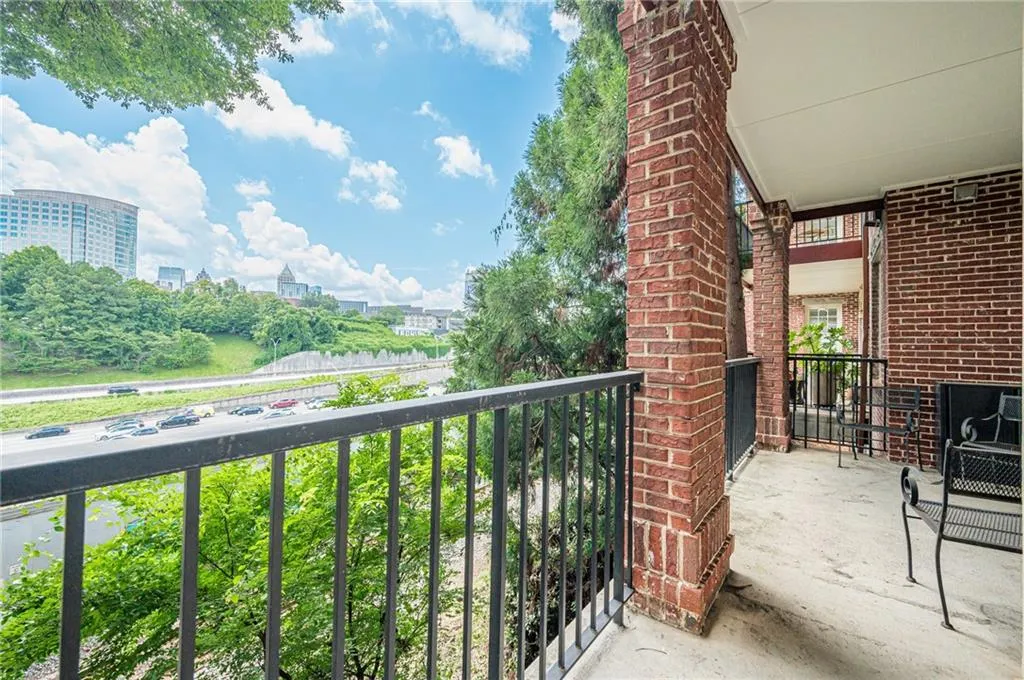 Balcony featuring a view of city