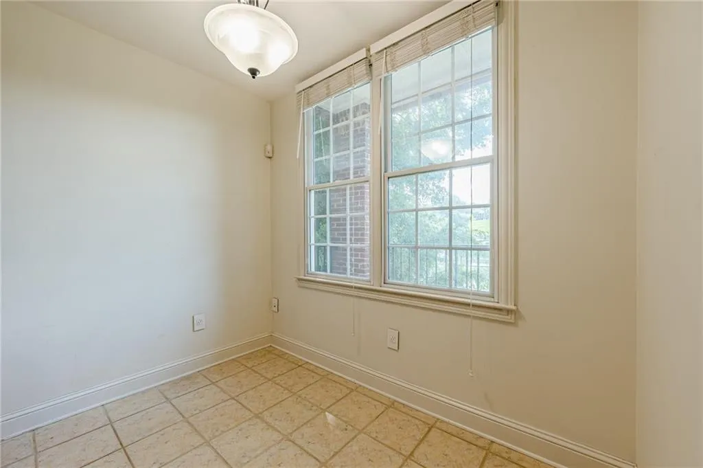Unfurnished room with plenty of natural light