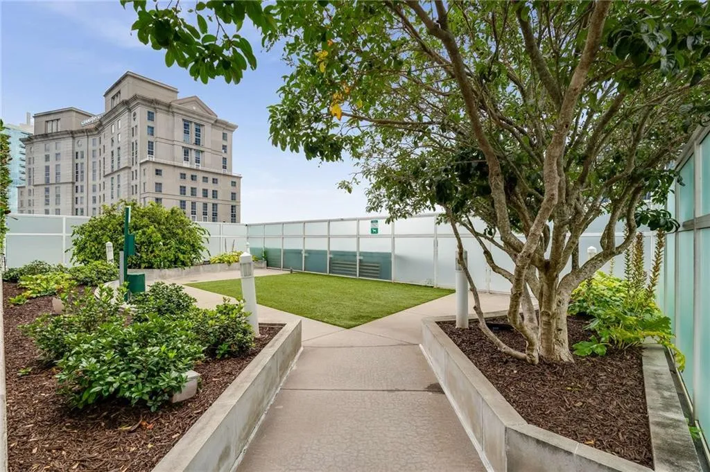 View of community with a fenced backyard