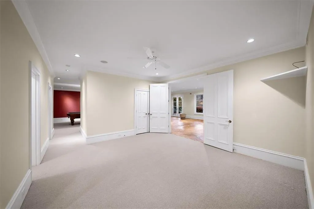 Bonus or sitting room outside of Bedroom 5 and Terrace level laundry Room