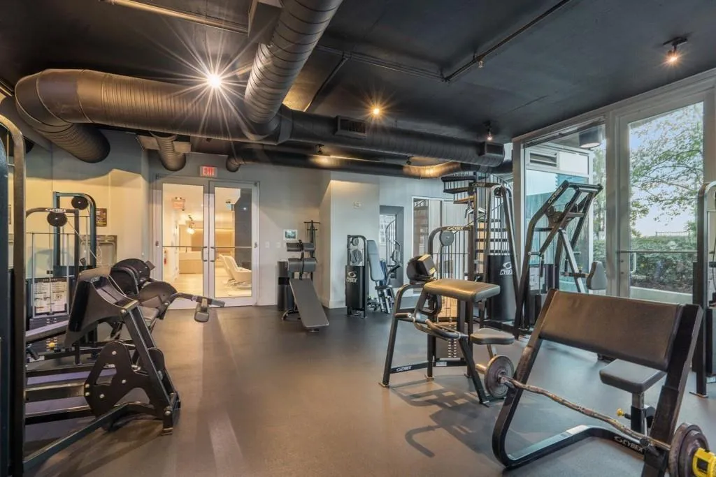 Realm Amenity - Two Story Fitness Center With Cardio Equipment And Weights