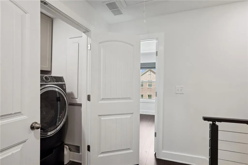Clothes washing area with cabinets