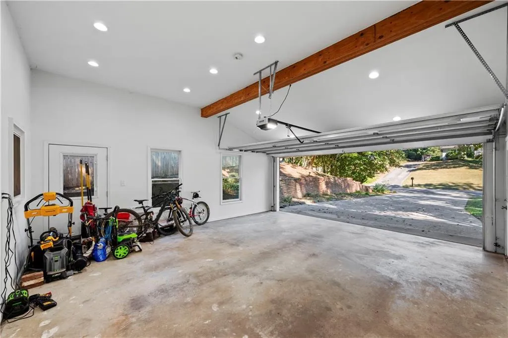 Garage featuring recessed lighting