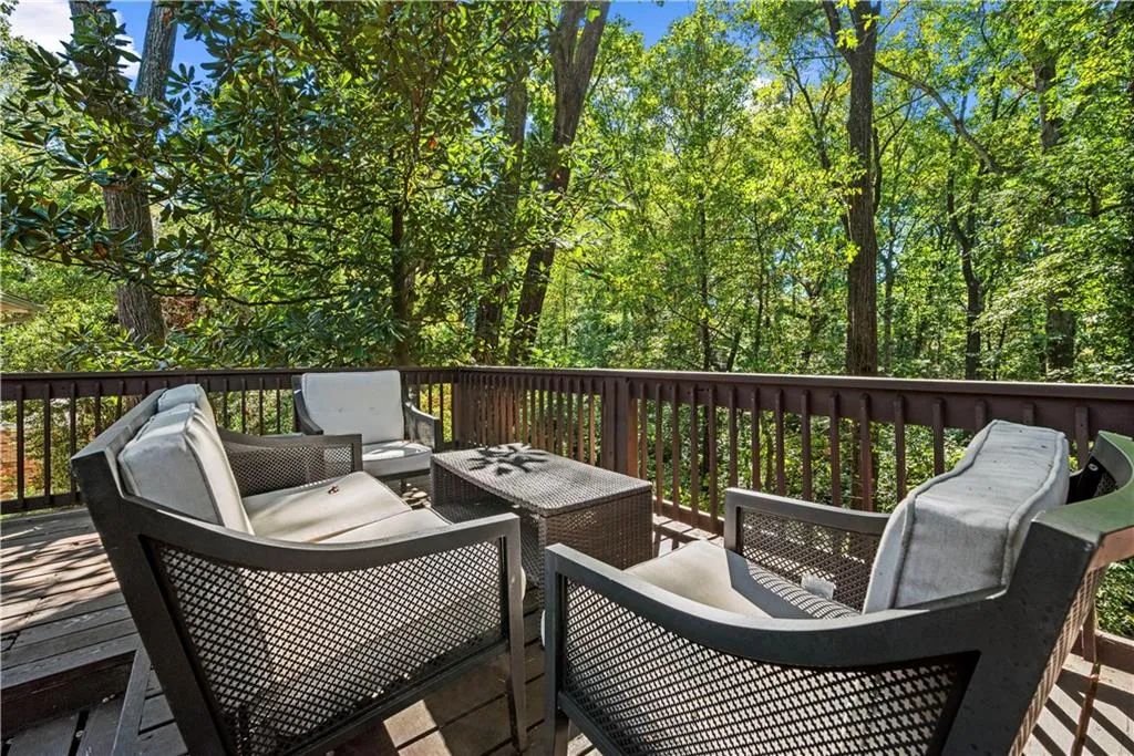 Wooden terrace featuring an outdoor living space