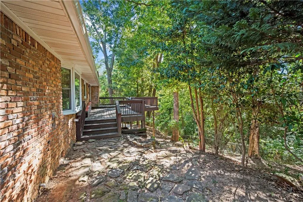 View of yard with a deck