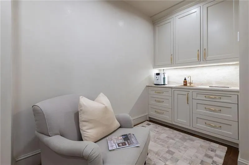 Sitting room and breakfast bar next to Primary Bedroom