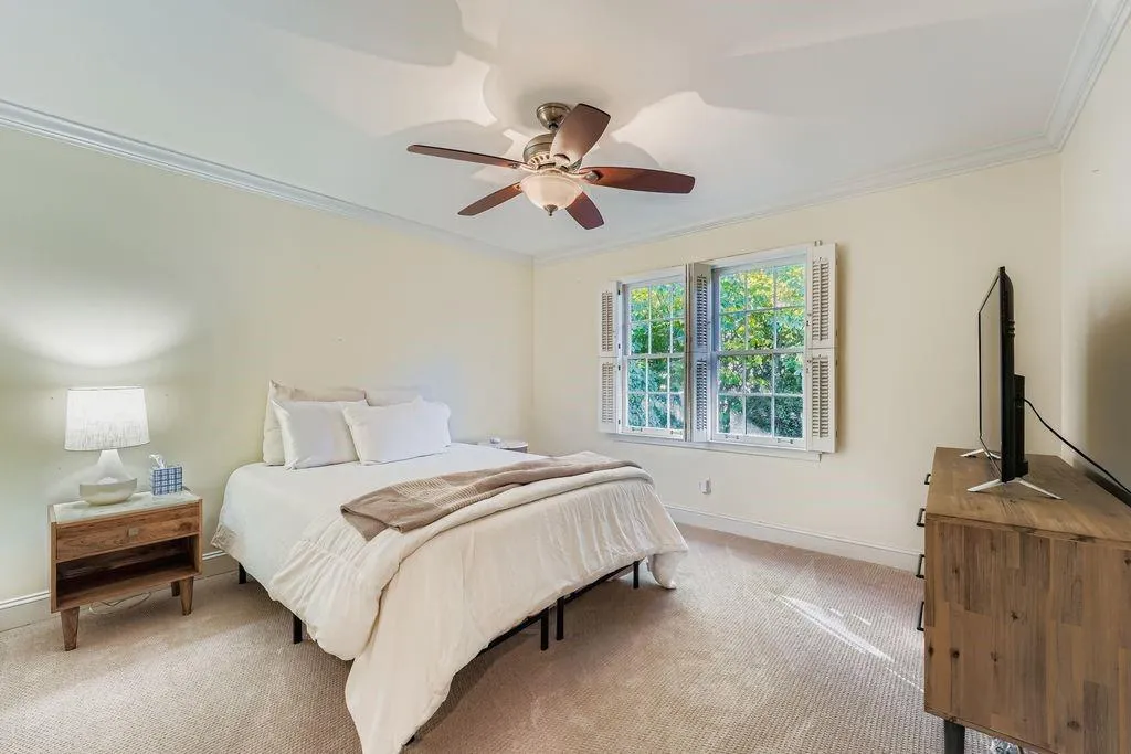 Third Bedroom with carpet flooring, ornamental molding, and ceiling fan Third Bedroom with carpet flooring, ornamental molding, and ceiling fan