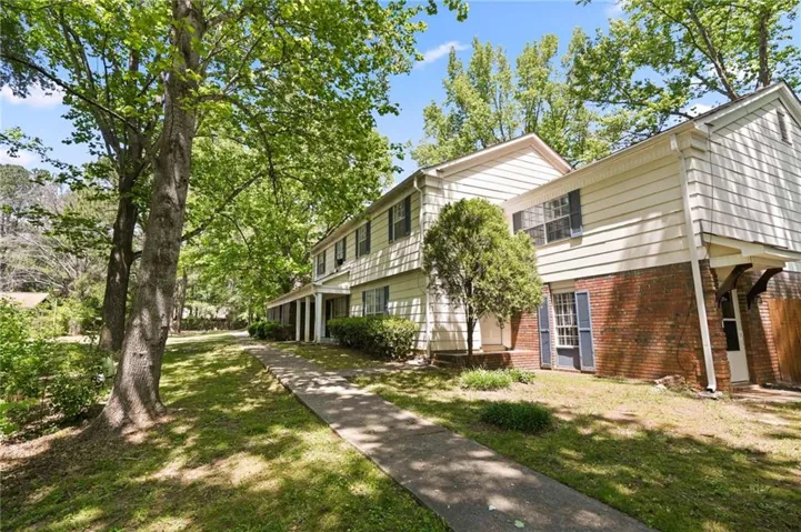 View of front of home featuring a front lawn