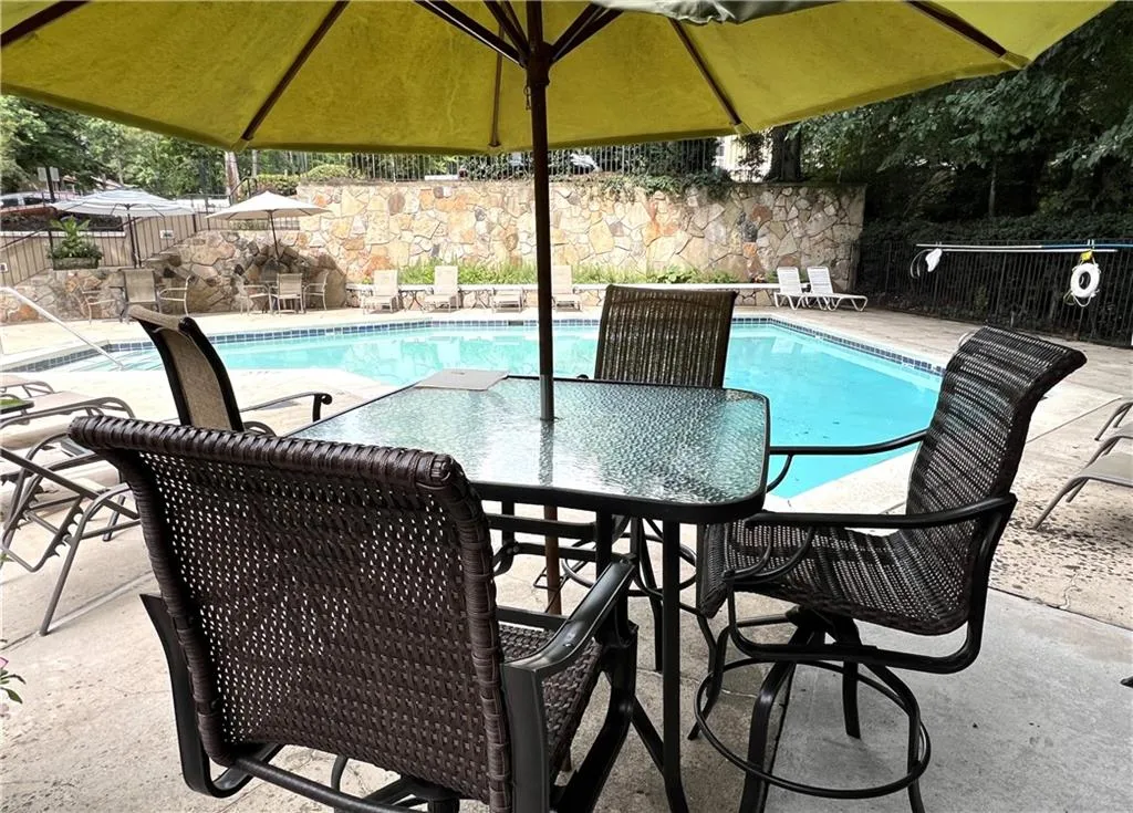 View of pool with a patio area
