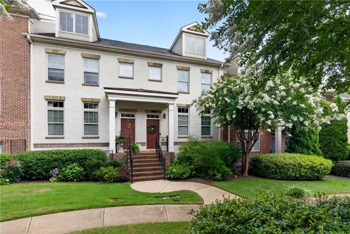 Townhome in a gated community offering swim, tennis, and a location walkable to Halcyon and the greenway.