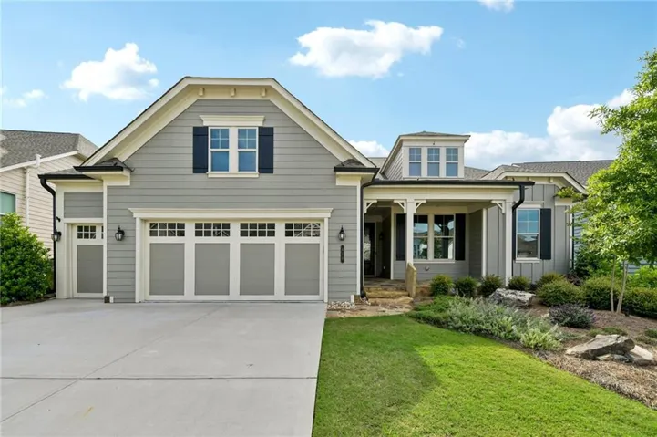Craftsman-style exterior with gray siding and white trim