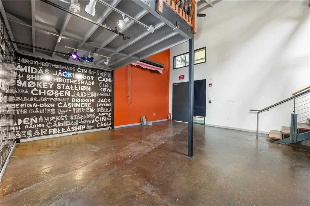 Garage featuring baseboards