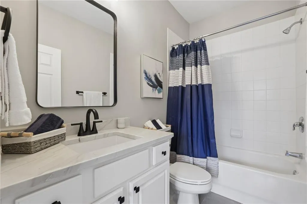 Additional guest suites feature renovated full baths.