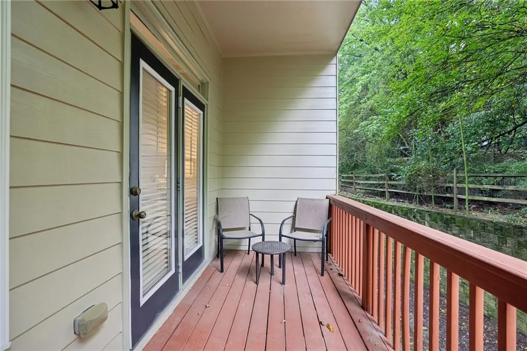 Balcony with private wooded views.