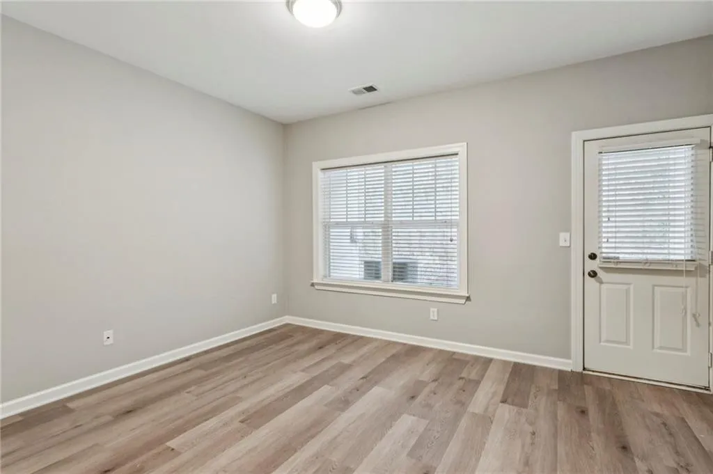 Flexible lower-level space perfect for guests, office, or gym.