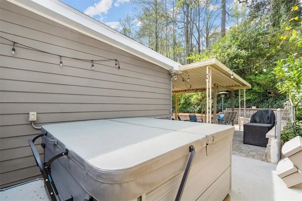 View of patio featuring a hot tub (not staying with home).