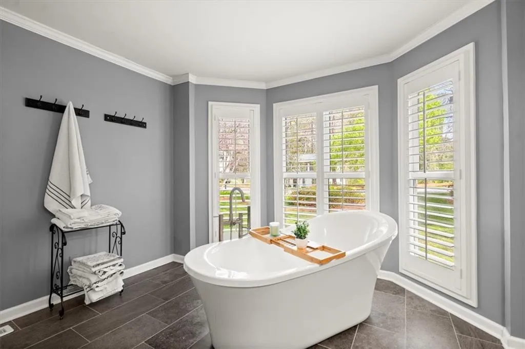 Owner's Suite Bathroom features a spa tub.