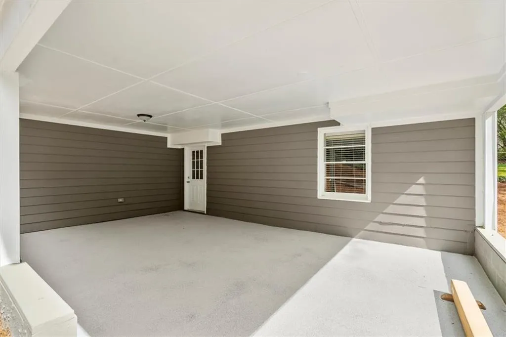 Come out from the terrace level office on this newly painted patio.  Great space to stay cool during the summer months and a great spot to hang a TV.