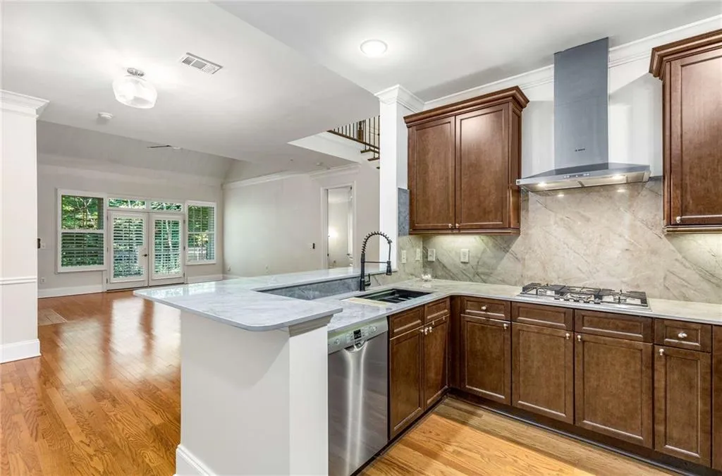 The Kitchen has an open view to the entire Great Room and patio.