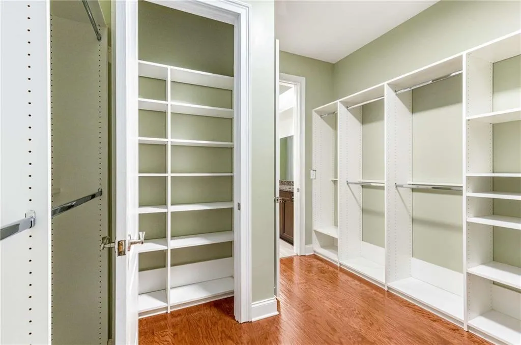 You will love the space in this room-size primary closet!  There's a separate closet within this closet which is not shown in the photos.
