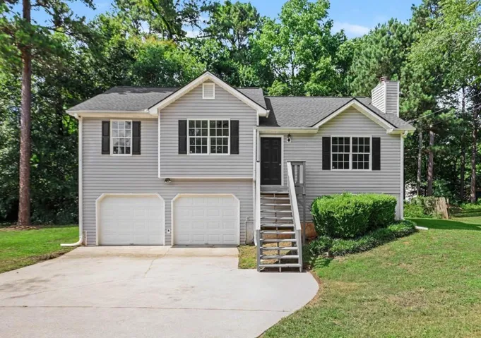 NEWLY UPDATED SPLIT FOYER WITH A UNIQUE FLOORPLAN! UNFINISHED BASEMENT STUBBED FOR A BATH.