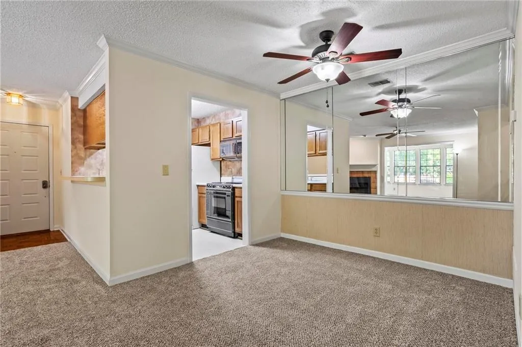 Dining Area to Kitchen with Breakfast Bar
