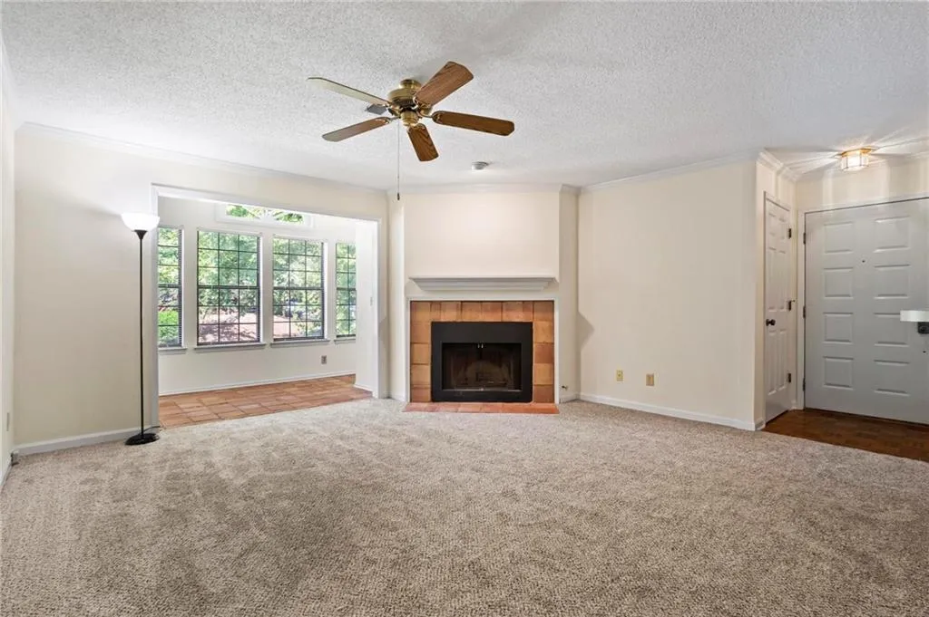 Family Room with Fireplace (view 2)