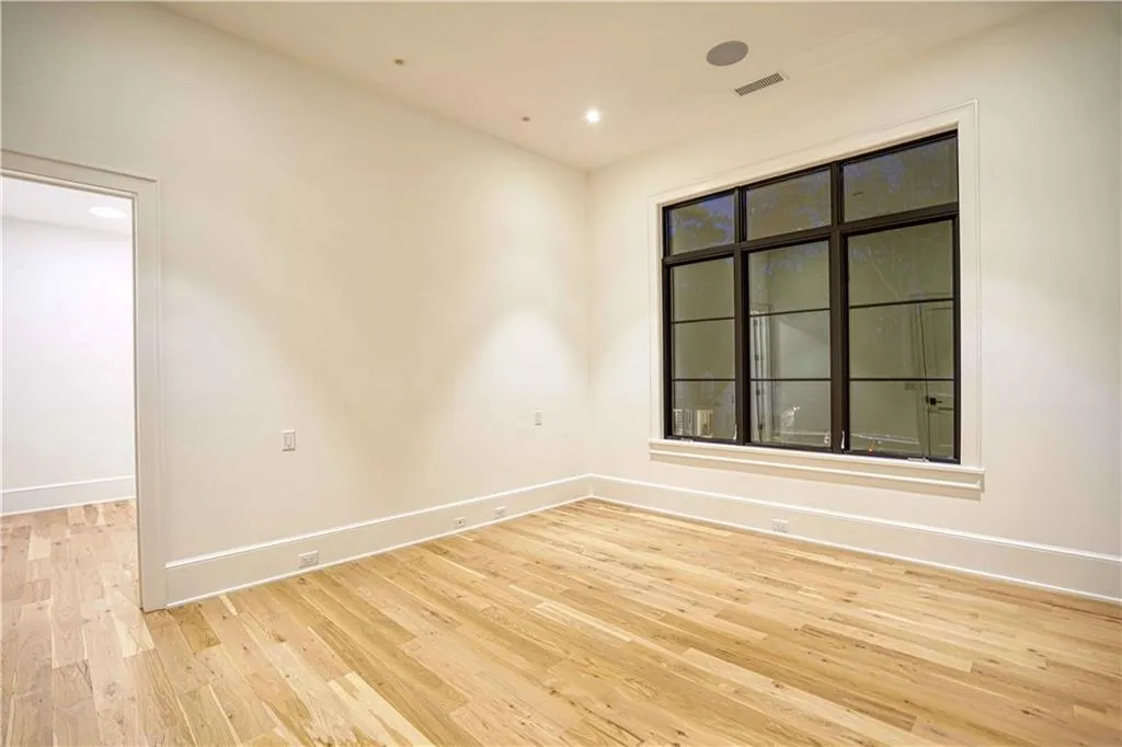 Empty room featuring light hardwood / wood-style flooring