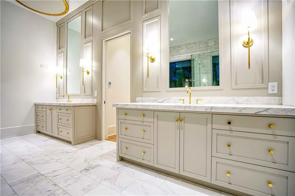 Bathroom featuring vanity and an enclosed shower