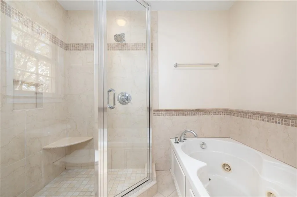 Upstairs Master Bathroom tub and shower.