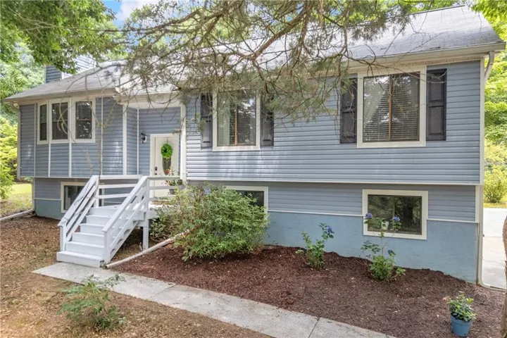 Nestled on 1.62 private acres with no HOA, this beautifully updated 3-bedroom, 2-bath split-level offers the space and freedom you’ve been searching for_4389 Center Hill Church Road_Loganville_GA_30052