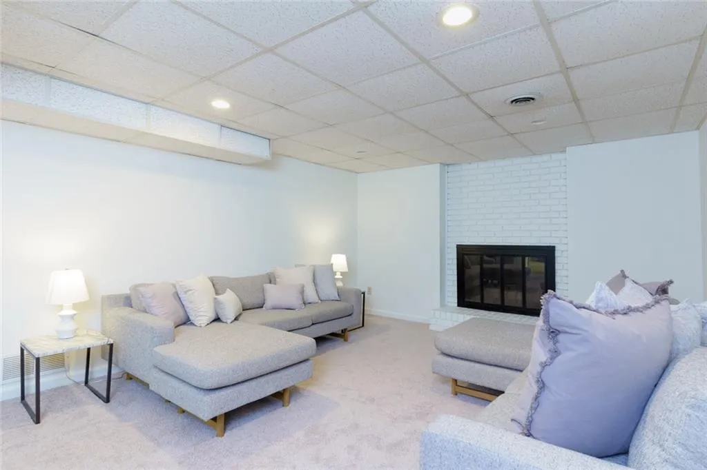 Spacious Terrace Level Rec Room/ Media/Rec Room/ Game Room/ 6th Bedroom with Fireplace- You decide!