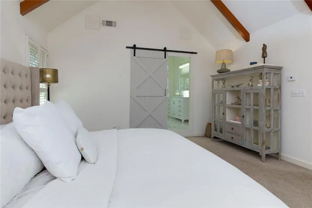 Primary Bedroom with View of Bathroom