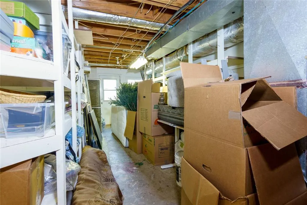 Terrace Level Storage Area with Exterior Exit to the Side of the Property.